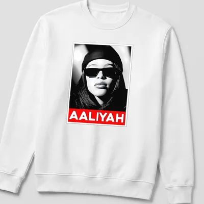 Monochrome portrait of Aaliyah with text in black, white, and red — printed on a unisex sweatshirt