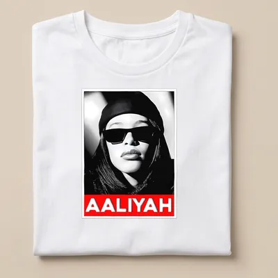 Monochrome portrait of Aaliyah with text in black, white, and red
