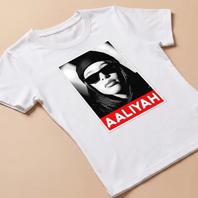 Monochrome portrait of Aaliyah with text in black, white, and red — printed on a women's shirt