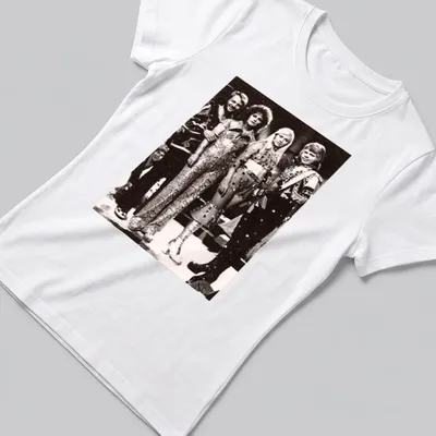 Vintage t-shirt featuring the name ABBA in bold lettering and a retro design — printed on a women's shirt