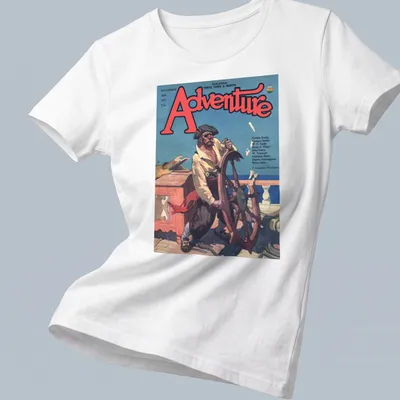 Vintage illustration of a pirate at the ship's wheel on an Adventure Magazine tee. — printed on a women's shirt