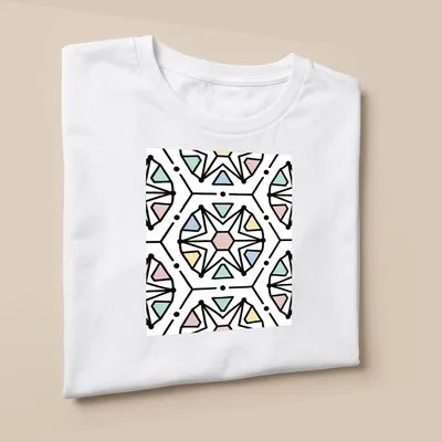 Seamless geometric pattern in black, pink, blue, green, and yellow — printed on a unisex t-shirt (angled view)