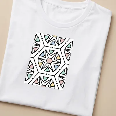Seamless geometric pattern in black, pink, blue, green, and yellow — printed on a women's shirt