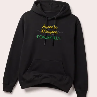 Playful script shirt with Agree to Disagree. PEACEFULLY. text in yellow and green. — printed on a unisex hoodie