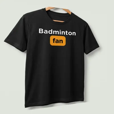 Bold typography Badminton Fan T-shirt in black, orange, and white — printed on a unisex t-shirt (angled view)