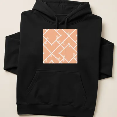 Chinoiserie style bamboo lattice pattern in peach and white on a — printed on a unisex hoodie