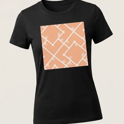 Chinoiserie style bamboo lattice pattern in peach and white on a — printed on a women's shirt