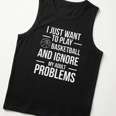 Playful basketball t-shirt with text about ignoring adult problems and a player in action — printed on a tank top