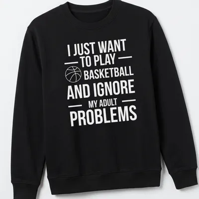 Playful basketball t-shirt with text about ignoring adult problems and a player in action — printed on a unisex sweatshirt