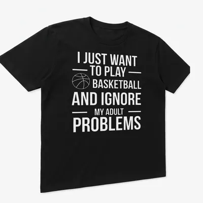 Playful basketball t-shirt with text about ignoring adult problems and a player in action — printed on a unisex t-shirt (angled view)