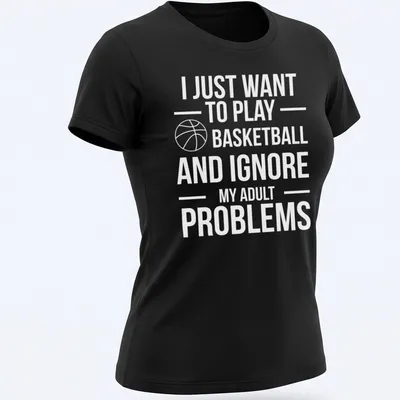 Playful basketball t-shirt with text about ignoring adult problems and a player in action — printed on a women's shirt