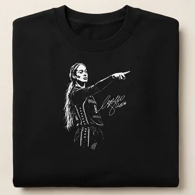 Illustration of a basketball player named Sophie Point in black, white, and orange. — printed on a unisex sweatshirt