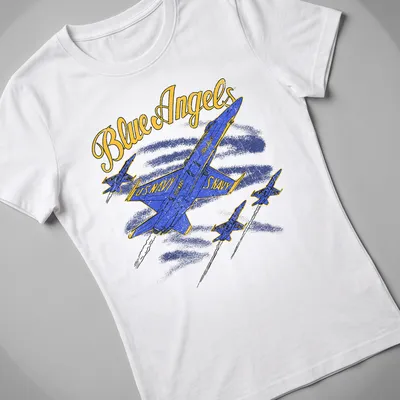 Retro distressed Blue Angels U.S. Navy tee featuring blue jets and bold text — printed on a women's shirt