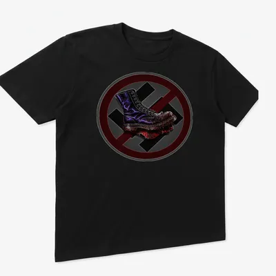 Bold illustration of a military boot in black with red, purple, and gray accents — printed on a unisex t-shirt (angled view)