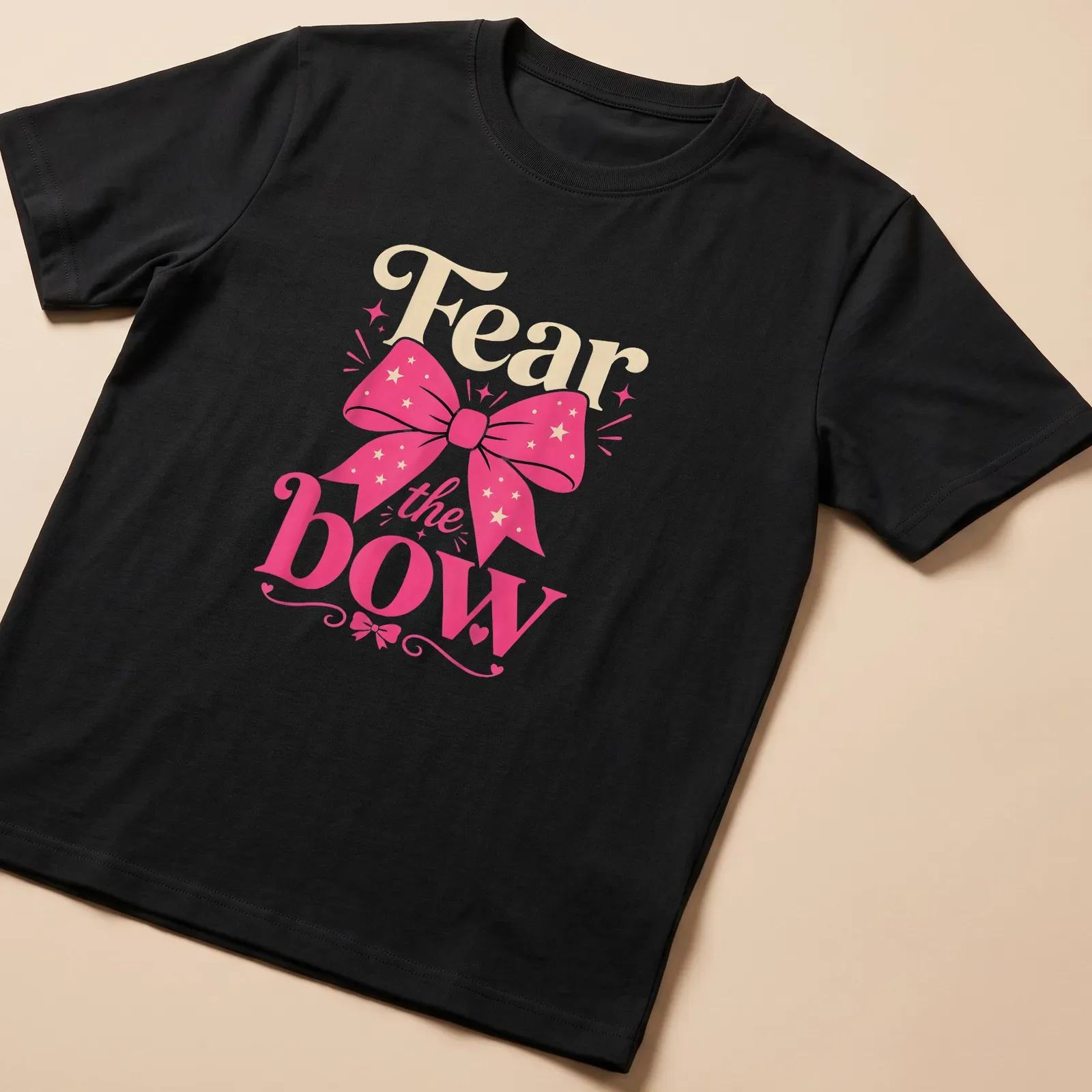 Colorful shirt featuring a playful design with a pink bow and the text 'Fear the bow' in vibrant colors. — printed on a unisex t-shirt