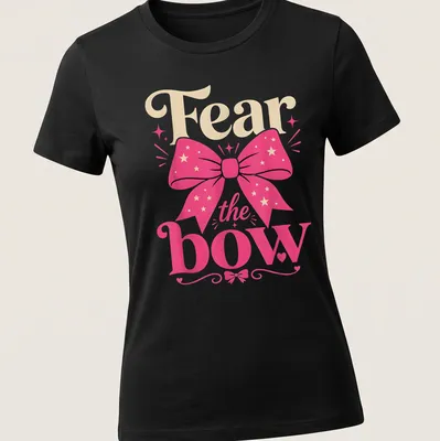 Colorful shirt featuring a playful design with a pink bow and the text 'Fear the bow' in vibrant colors. — printed on a women's shirt