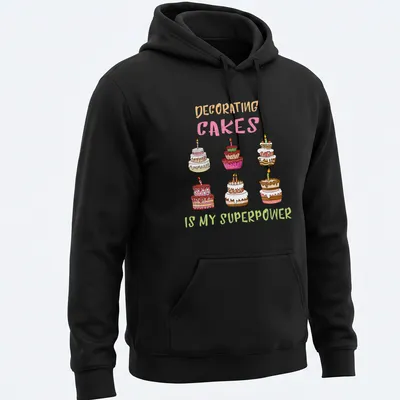 Kawaii line-art T-shirt with colorful decorated cakes and text about cake decorating. — printed on a unisex hoodie
