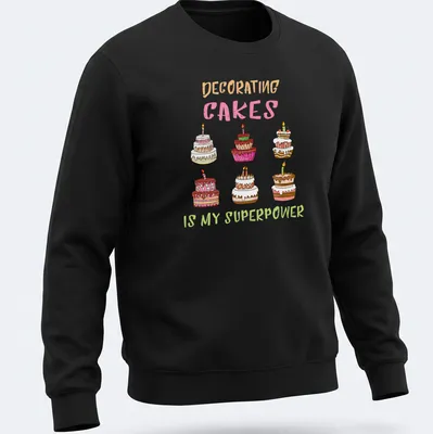 Kawaii line-art T-shirt with colorful decorated cakes and text about cake decorating. — printed on a unisex sweatshirt