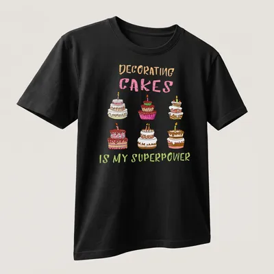 Kawaii line-art T-shirt with colorful decorated cakes and text about cake decorating. — printed on a unisex t-shirt (angled view)