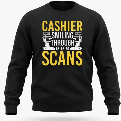 Bold typography T-shirt with the text 'CASHIER SMILING THROUGH SCANS' in yellow and white — printed on a unisex sweatshirt