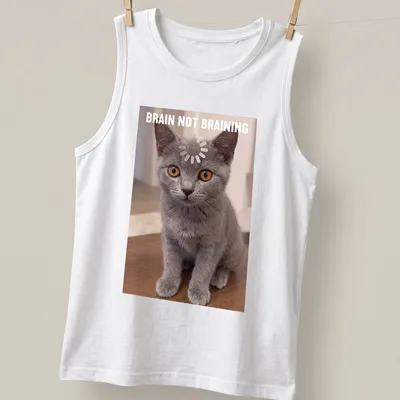 Realistic print of a Chartreux kitten with the text 'BRAIN NOT BRAINING' in gray, orange, and white. — printed on a tank top