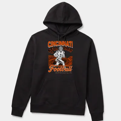 Vintage retro Cincinnati Football t-shirt featuring a player and established year — printed on a unisex hoodie
