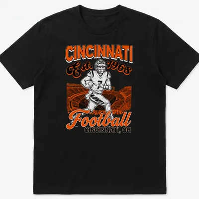 Vintage retro Cincinnati Football t-shirt featuring a player and established year