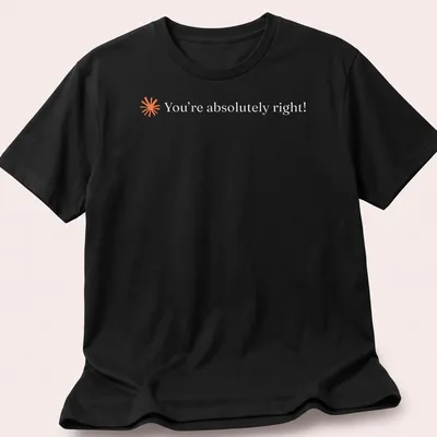 Minimalist tee featuring the text You're absolutely right! in orange on white.