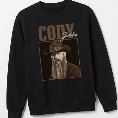 Vintage sepia portrait of Cody Jinks in cowboy hat with text — printed on a unisex sweatshirt