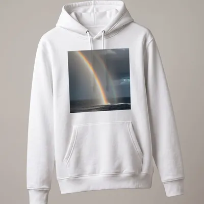Realistic print of a colorful rainbow over an ocean waterspout — printed on a unisex hoodie
