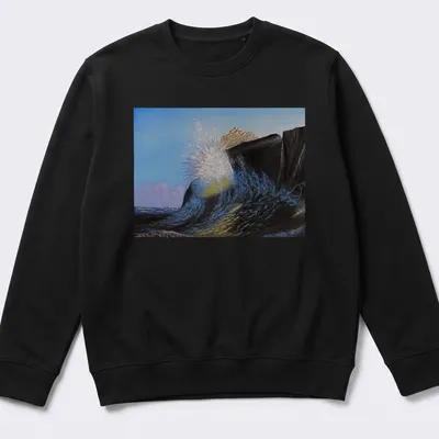 Realistic print of crashing waves against a rocky shore in blue and brown tones — printed on a unisex sweatshirt