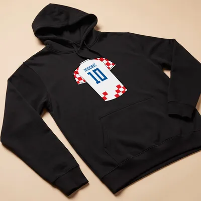 Croatia football kit t-shirt with MODRIĆ 10 in white, red, and blue typography — printed on a unisex hoodie