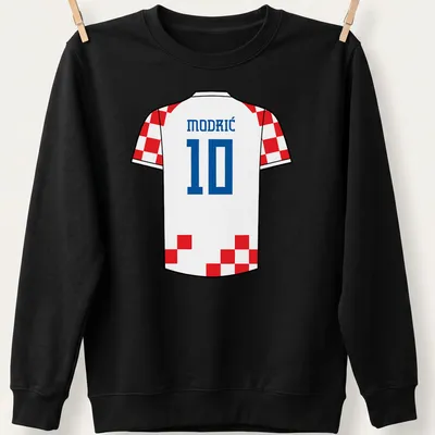 Croatia football kit t-shirt with MODRIĆ 10 in white, red, and blue typography — printed on a unisex sweatshirt