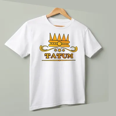 Bold typography with the name Tatum and a crown above it in gold and black. — printed on a unisex t-shirt (angled view)