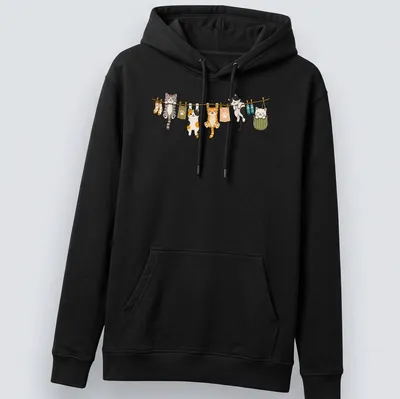 Kawaii print of cute cats hanging in playful poses in various colors — printed on a unisex hoodie