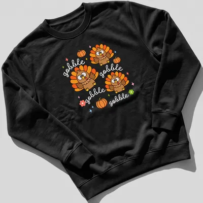 Kawaii cute turkey with cheerful expression and Gobble Gobble text in vibrant colors — printed on a unisex sweatshirt