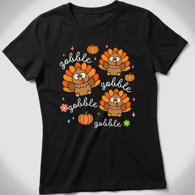 Kawaii cute turkey with cheerful expression and Gobble Gobble text in vibrant colors — printed on a women's shirt