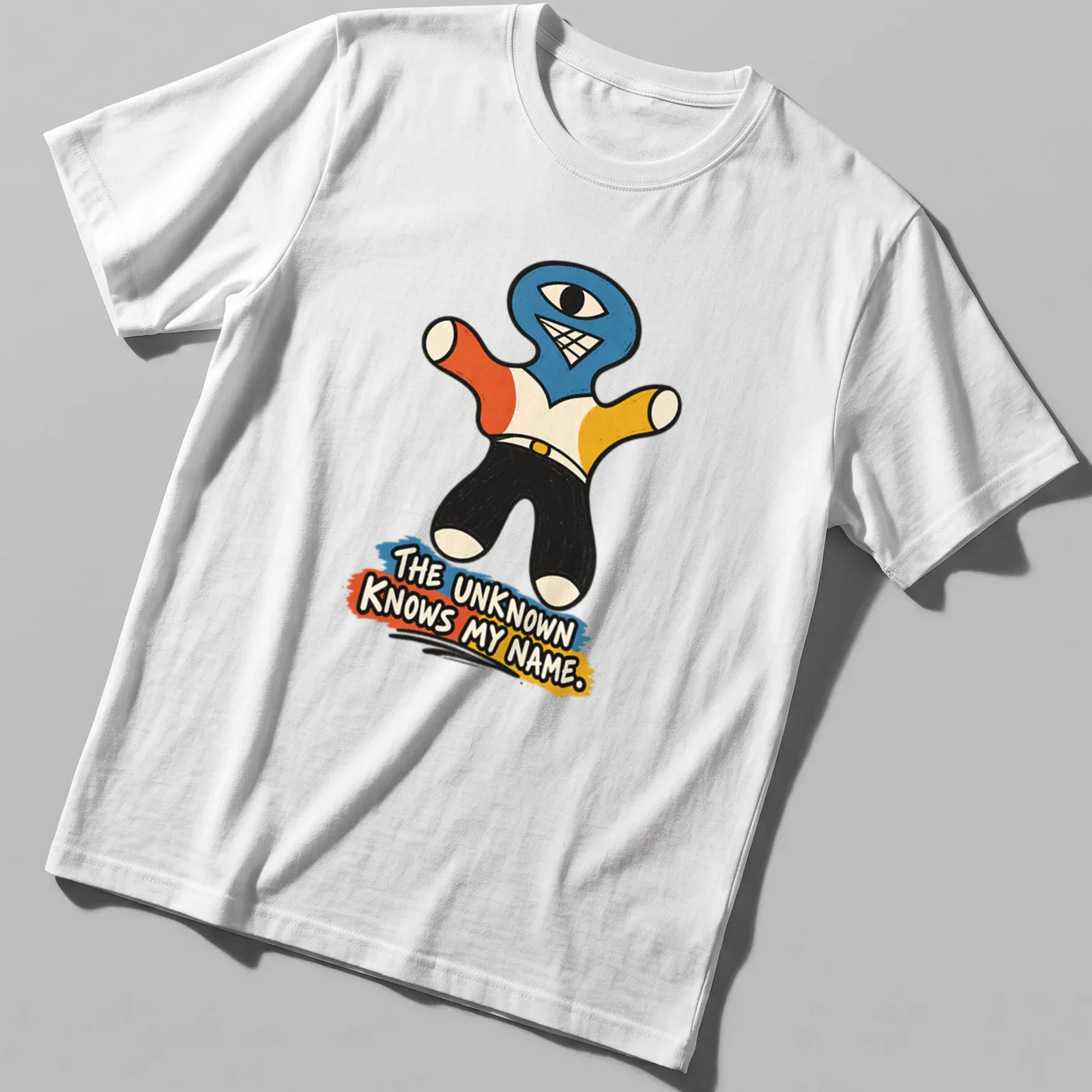 Colorful cartoon Cyclops character with text 'THE UNKNOWN KNOWS MY NAME.' — printed on a unisex t-shirt