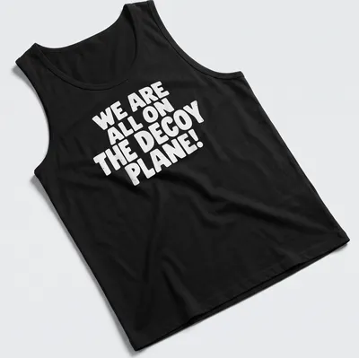 Bold typography shirt saying 'WE ARE ALL ON THE DECoy PLANE!' in white — printed on a tank top