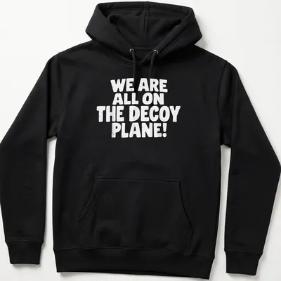 Bold typography shirt saying 'WE ARE ALL ON THE DECoy PLANE!' in white — printed on a unisex hoodie
