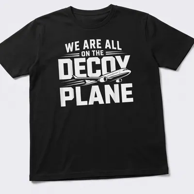 Bold typography shirt with the phrase We Are All On The Decoy Plane in white and black