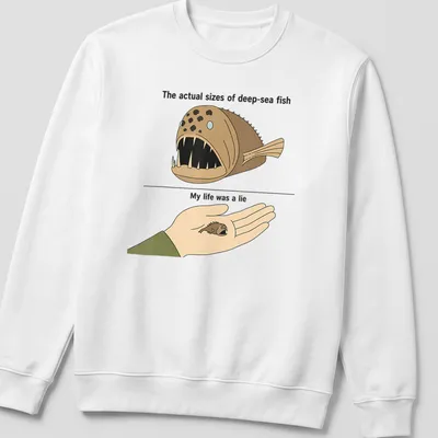 Cartoon design featuring humorous deep-sea fish sizes with printed text. — printed on a unisex sweatshirt