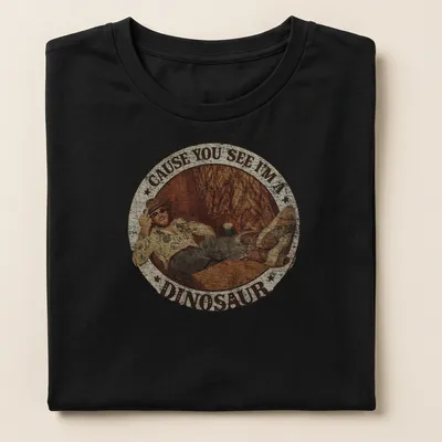 Retro distressed t-shirt featuring a playful dinosaur illustration and humorous text. — printed on a women's shirt