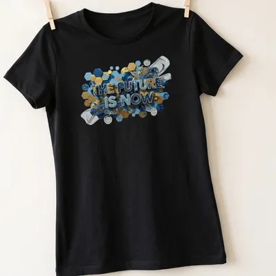 Navy t-shirt with 3D text reading 'THE FUTURE IS NOW' in gold, teal, and white — printed on a women's shirt