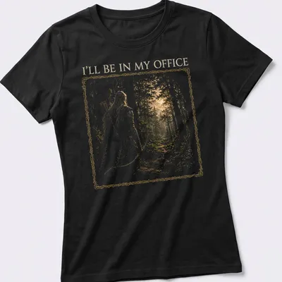 Fantasy illustration of an elf archer with text 'I'll Be In My Office' in gold and green — printed on a women's shirt