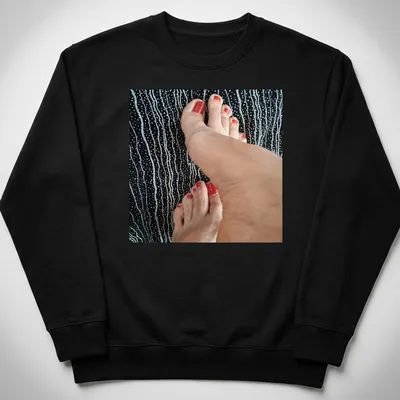 Photographic T-shirt featuring feet with red nail polish on a black background — printed on a unisex sweatshirt