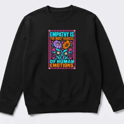 Vibrant floral design with the phrase on empathy in colorful lettering — printed on a unisex sweatshirt