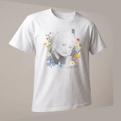 Portrait of Dolly Parton with flowers and butterflies in pastel colors. — printed on a unisex t-shirt (angled view)