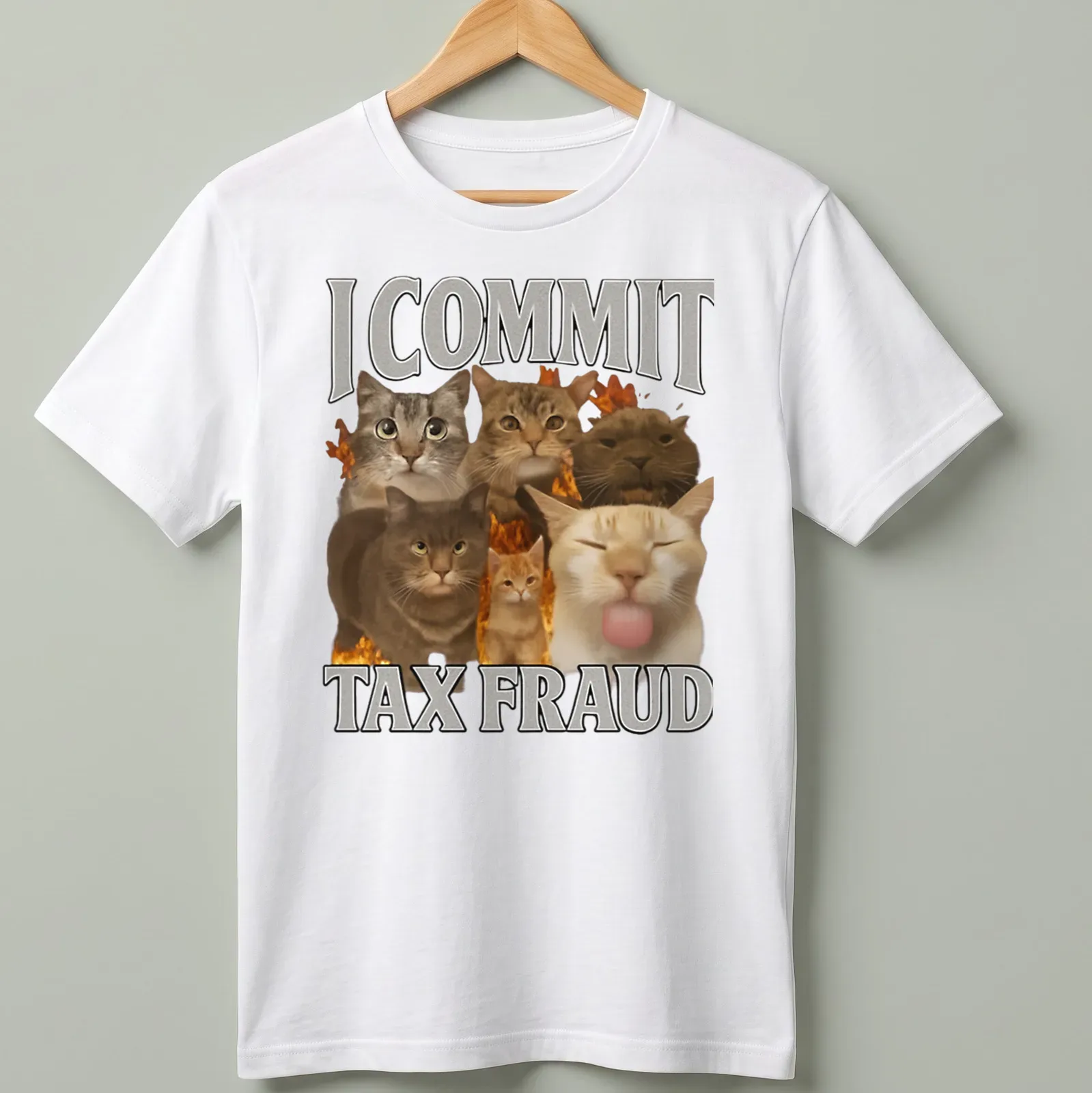 Humorous collage of cats with the text 'I COMMIT TAX FRAUD' — printed on a unisex t-shirt