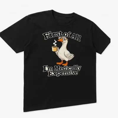 Cartoon duck with coffee and humorous text about medical expenses — printed on a unisex t-shirt (angled view)